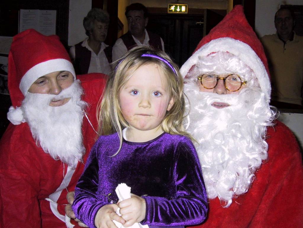 På nissens og hjelpenissens fang